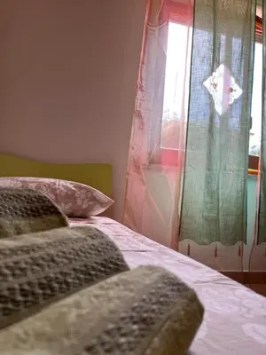 Letto o letti in una camera di DIP IN SICILY