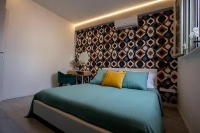 Letto o letti in una camera di Domus 25