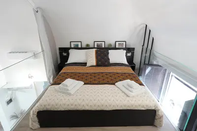 Letto o letti in una camera di Domus 25