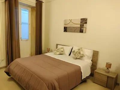 Letto o letti in una camera di Sunset Ortigia-locazione turistica
