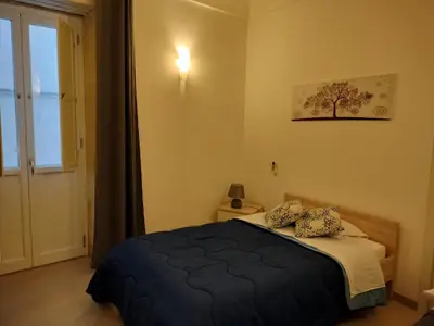 Letto o letti in una camera di Sunset Ortigia-locazione turistica