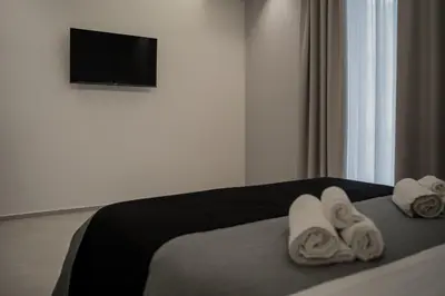 Letto o letti in una camera di Jay House