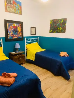 Letto o letti in una camera di Casa Franca a Marzamemi