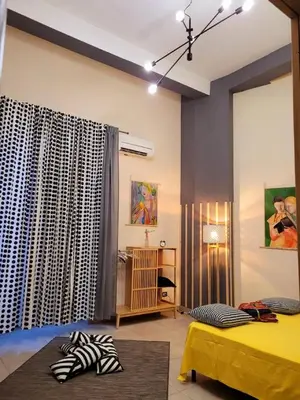 Letto o letti in una camera di INDUSTRY HOME