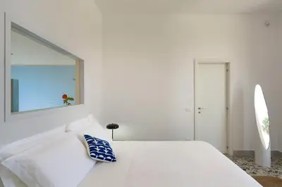 Letto o letti in una camera di La Belle
