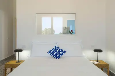 Letto o letti in una camera di La Belle