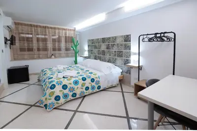 Letto o letti in una camera di B&b Essence Ispica