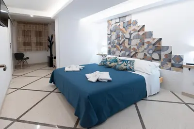 Letto o letti in una camera di B&b Essence Ispica