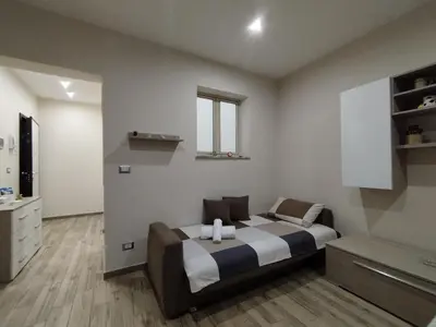 Letto o letti in una camera di Casa Paolina