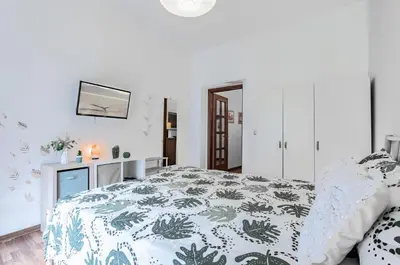 Letto o letti in una camera di GuestHost - Casa Giuffri - Castello Ursino Flat with Balcony