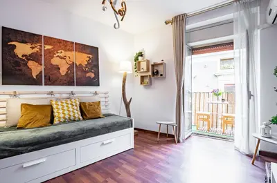 Area soggiorno di GuestHost - Casa Giuffri - Castello Ursino Flat with Balcony