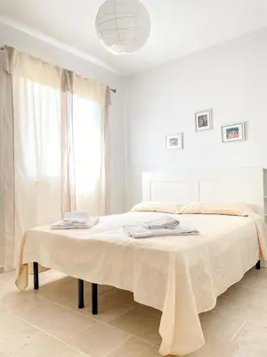 Letto o letti in una camera di Villa Nesea Marzamemi