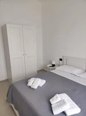 Letto o letti in una camera di Villa Rita Apartament & Rooms