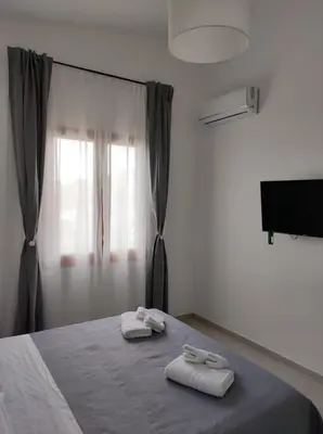 Letto o letti in una camera di Villa Rita Apartament & Rooms