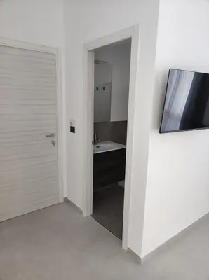 TV o dispositivi per l'intrattenimento presso Villa Rita Apartament & Rooms