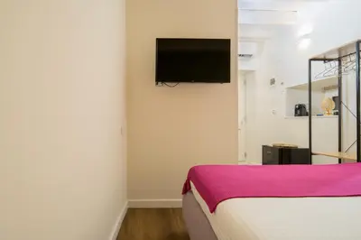 TV o dispositivi per l'intrattenimento presso The Room Ortigia