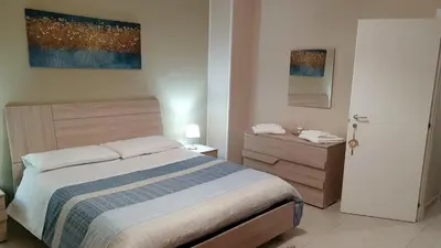 Letto o letti in una camera di Appartamento - Serena