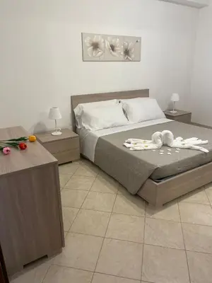 Letto o letti in una camera di FlorAngè guest house