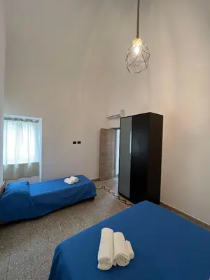 Letto o letti in una camera di La casa di Marina - al Duomo