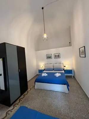 Letto o letti in una camera di La casa di Marina - al Duomo