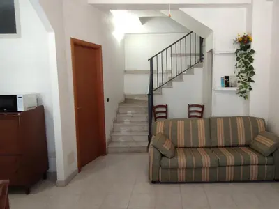 Area soggiorno di Holiday Home MarEmi Portopalo by Interhome