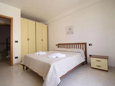 Letto o letti in una camera di Holiday Home MarEmi Portopalo by Interhome