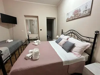 Letto o letti in una camera di Villa Leale