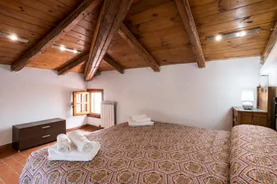 Letto o letti in una camera di Casa vacanza al mare