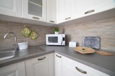 Cucina o angolo cottura di Alfeo E Aretusa Apartment