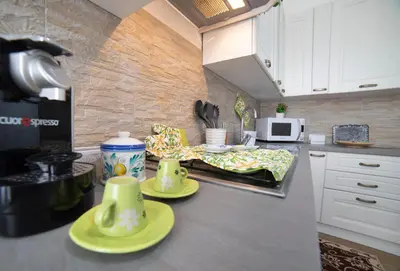 Cucina o angolo cottura di Alfeo E Aretusa Apartment