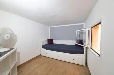 Letto o letti in una camera di Alfeo E Aretusa Apartment