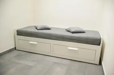 Letto o letti in una camera di Wellness Home Catania
