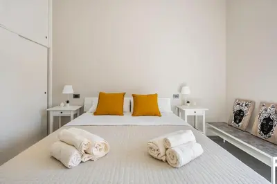 Letto o letti in una camera di Dolci Ricordi - Casa Vacanza Siracusa Centro