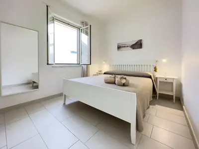 Letto o letti in una camera di Casa Tuminello Granelli