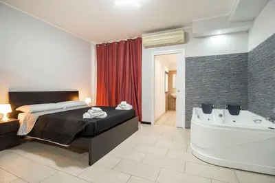 Letto o letti in una camera di Royal Playa Suite and Apartament -private parking- self chek out