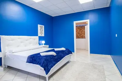 Letto o letti in una camera di Royal Playa Suite and Apartament -private parking- self chek out