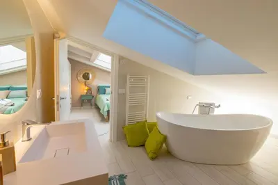 Letto o letti in una camera di Melifra, Jacuzzi e Vista Panoramica