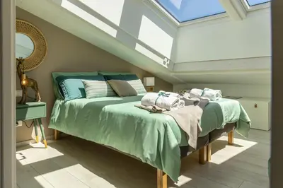 Letto o letti in una camera di Melifra, Jacuzzi e Vista Panoramica