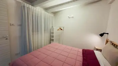 Letto o letti in una camera di Plemmirio Apartments