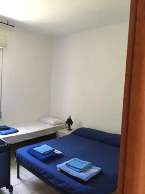 Letto o letti in una camera di Villetta San Lorenzo - Marzamemi