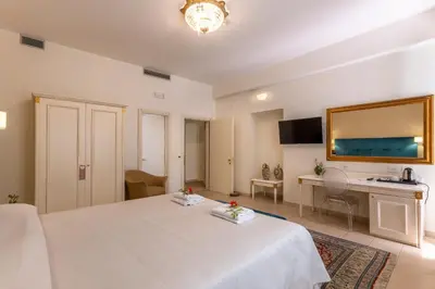 Letto o letti in una camera di Hotel Parco delle Fontane