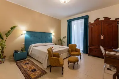 Letto o letti in una camera di Hotel Parco delle Fontane