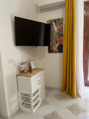 TV o dispositivi per l'intrattenimento presso GL Golden City Apartments