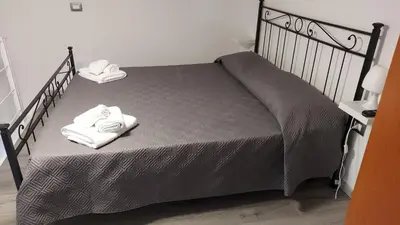 Letto o letti in una camera di Appartamento in centro