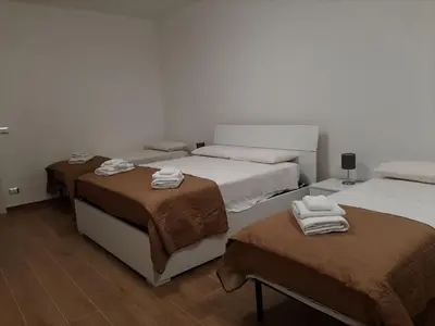Letto o letti in una camera di Casa Guttuso 1