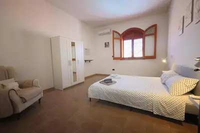 Letto o letti in una camera di Casa di Sara&Anna