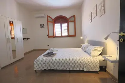 Letto o letti in una camera di Casa di Sara&Anna