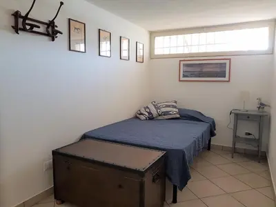 Letto o letti in una camera di Villa al mare sulla scogliera