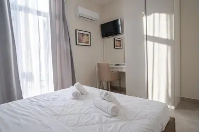 Letto o letti in una camera di A Casa Mia - Catania Apartment