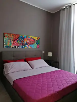 Letto o letti in una camera di A Casa Mia - Catania Apartment